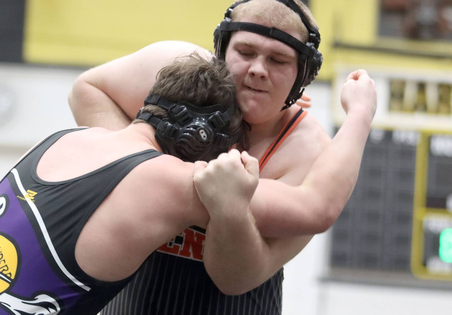 Crystal Lake Central’s Logan Gough battles Belvidere’s Benjamin Prochnicki at 285 pounds in boys wrestling IHSA Class 2A Regional championship bout action on Saturday, Jan. 31, 2026, at Harvard High School in Harvard.