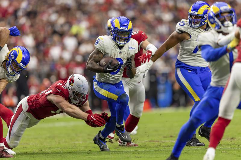 Running back (3) Cam Akers of the Los Angeles Rams runs the ball for a touchdown against the Arizona Cardinals in an NFL football game, Sunday, Sept. 25, 2022, in Glendale, AZ. Rams won 20-12. (AP Photo/Jeff Lewis)