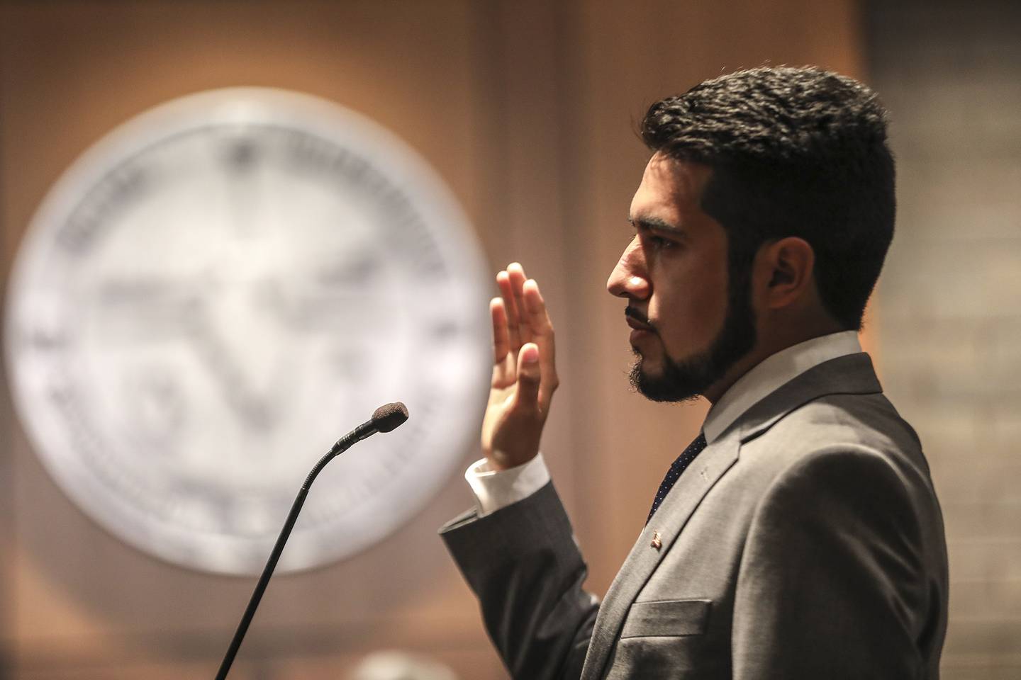 Cesar Guerrero is sworn in as a member of the Joliet City Council on Monday, May 3, 2021, at Joliet City Hall in Joliet, Ill. After a tight race, three new City Councilman were sworn in at a special meeting on Tuesday.