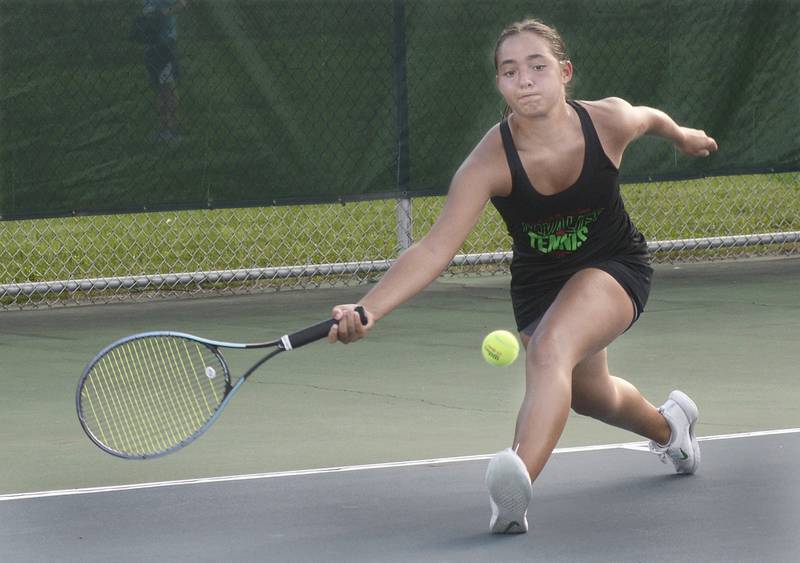 La Salle Peru’s Grace Pecchio competes in the #1 singles match against Ottawa Tuesday at Ottawa Township High School.