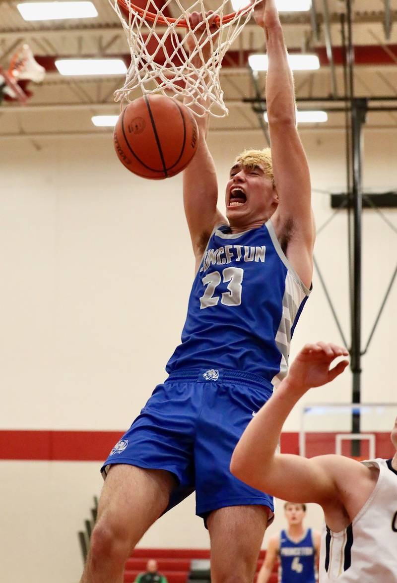 Princeton junior Noah LaPorte throws down a dunk during Friday's game at Hall High School. He scored 30 points to lead the Tigers to a 70-62 win over Ottawa Marquette.