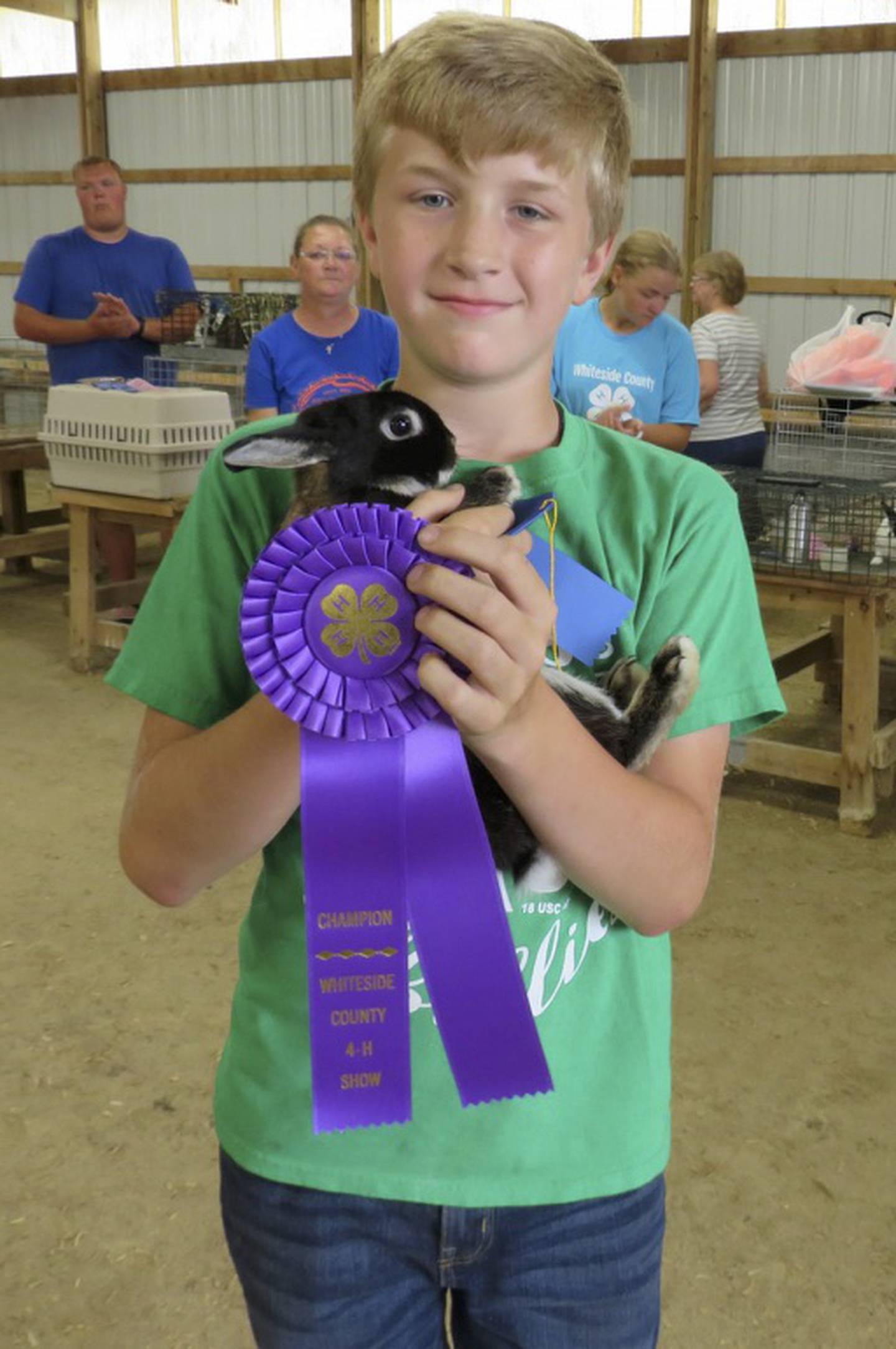 Mason Camps of the Genesee Hillbillies 4-H Club of Sterling at the 4-H Rabbit Show held on Friday, July 8