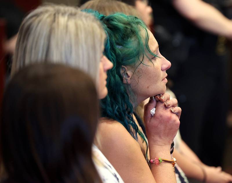 Ericka Sasso, mother of Gracie Sasso-Cleveland who was murdered by Timothy Doll in 2023, listens as Circuit Court Judge Philip Montgomery pronounces his sentence Thursday, Aug. 14, 2025, at the DeKalb County Courthouse in Sycamore. Doll was sentenced to 52 years in prison.