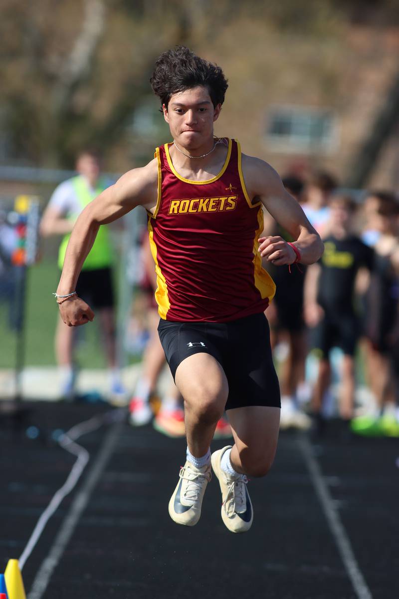 Richmond-Burton’s Nicholas Satkiewicz competes in the triple jump during the McHenry County Track and Field Meet at McCracken Field on Thursday, April 24, 2025, in McHenry