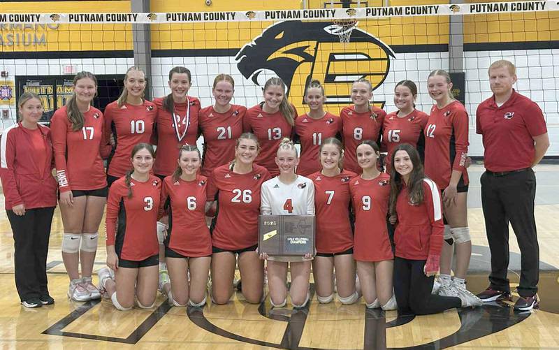 Members of the Henry-Senachwine volleyball team pose with the Tri-County Conference championship plaque on Thursday, Oct. 16, 2025 at Putnam County High School.