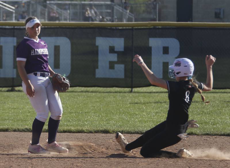 Hampshire's Adi Edlen covers second base as Huntley's Keely Fewell steals the base during a Fox Valley Conference softball game on Thursday, May 14, 2026, at Huntley High School.