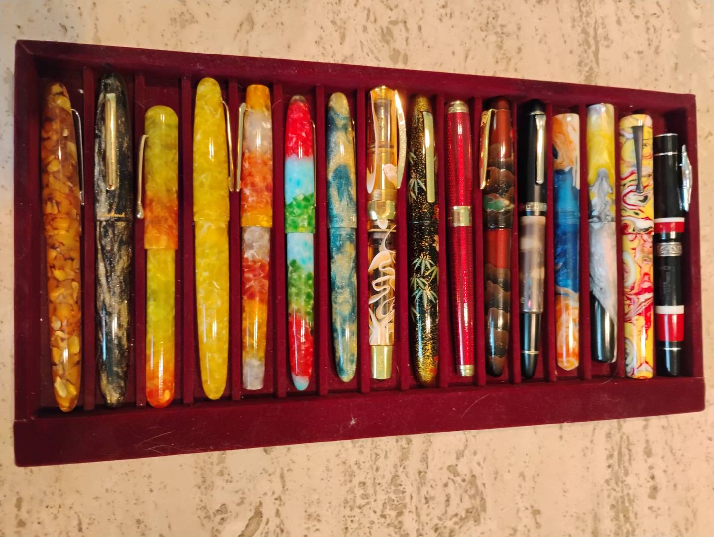 Colorful Esterbrook fountain pen reproductions in the collection of Geneva resident Paul Conterato.