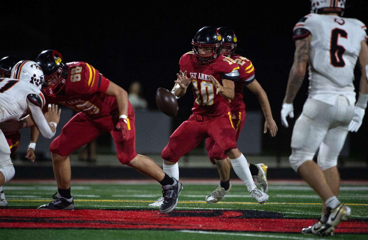 St. Anne's Grant Pomaranski takes the snap in a game against South Fork on Friday, Septermber 26, 2025.