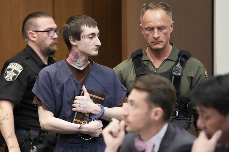 Robert E. Crimo III arrives before Judge Victoria A. Rossetti during a case management and ruling on motions at the Lake County Courthouse, Waukegan, Ill., Wednesday, Dec. 18, 2024.