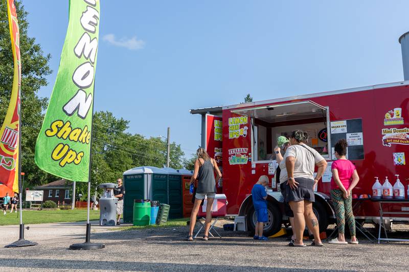 Families attend the annual Wenona Days events on Saturday, August 9, 2025 on Chestnut Street in Wenona.