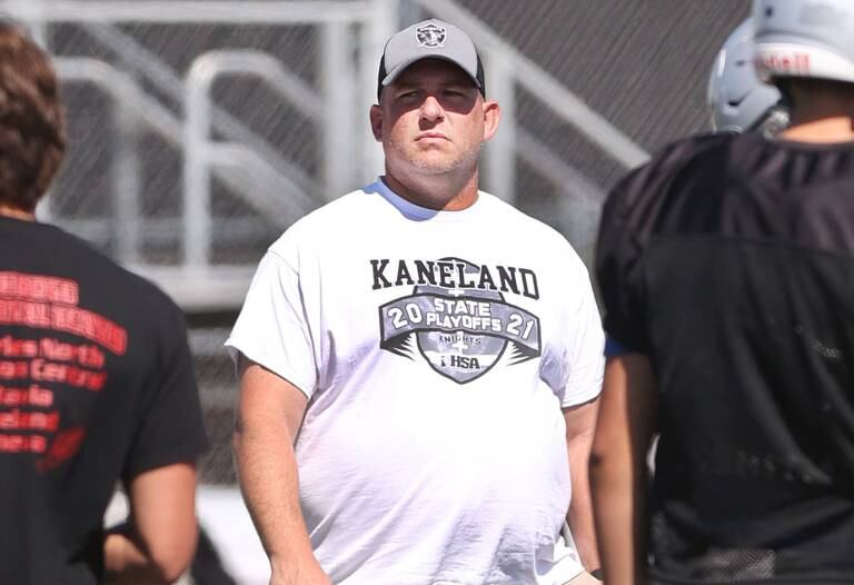 Kaneland head coach Pat Ryan watches his team go through drills during a joint football practice with DeKalb Thursday, July 14, 2022, at DeKalb High School.