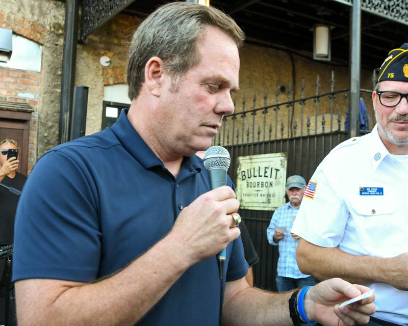 Mayor of Geneva Kevin Burns announces the second-place winner of the 50/50 raffle at an American Legion fundraiser on Thursday Aug. 21, 2025, held at Whiskey Bend in St. Charles.