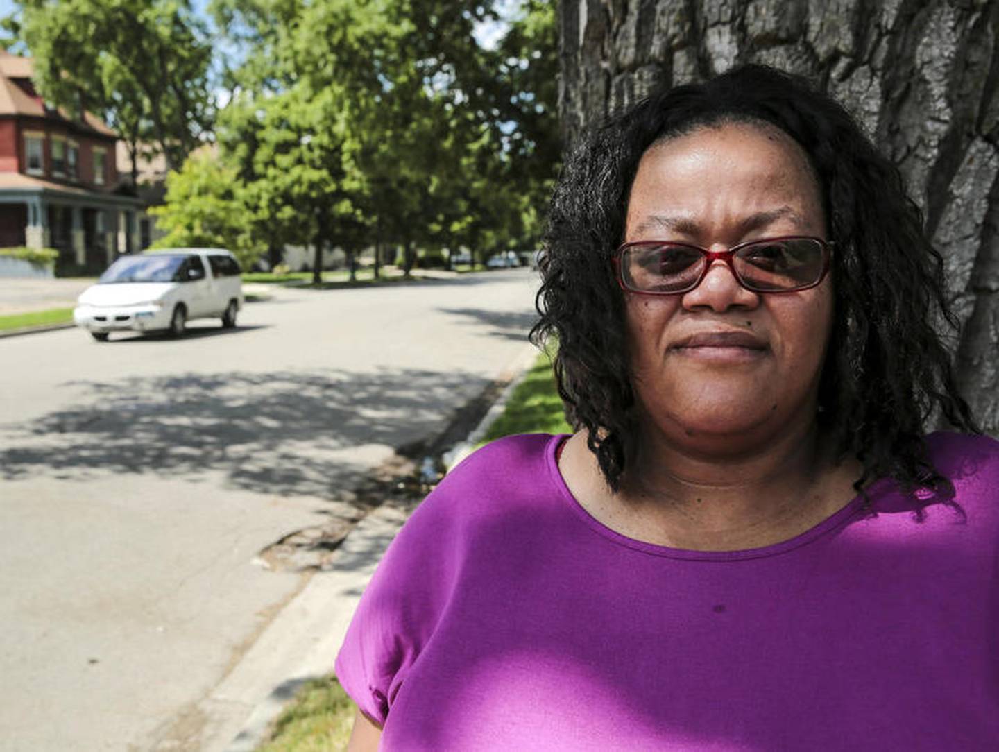 Konika Morrow stands along the curb where she was tackled by Joliet Police on Wednesday, July 10, 2019, in Joliet, Ill.