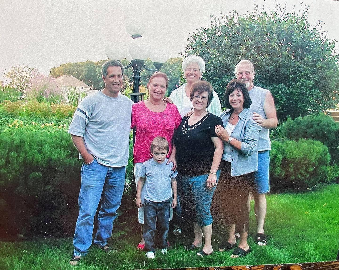 Carmel Perino is pictured with some of her family, including her cousin Rose (in the pink shirt), her sister Phyllis (in the white shirt) and her grandson Oz Yangas (directly in front of Rose).