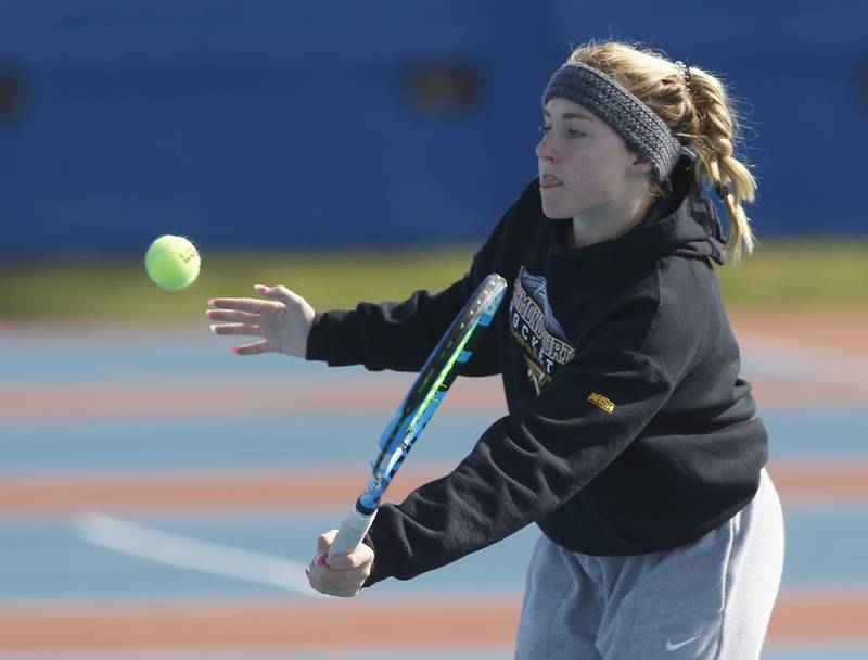 Richmond-Burton’s Savannah Webb returns the ball Thursday, Oct. 20, 2022, during during the first day of the IHSA State Girls Tennis Tournament at Hoffman Estates High School in Hoffman Estates.