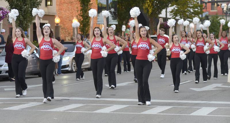 The Ottawa Poms and Cheerleaders marched Wednesday evening during  the Homecoming Parade route on La Salle St Wednesday evening in Ottawa.