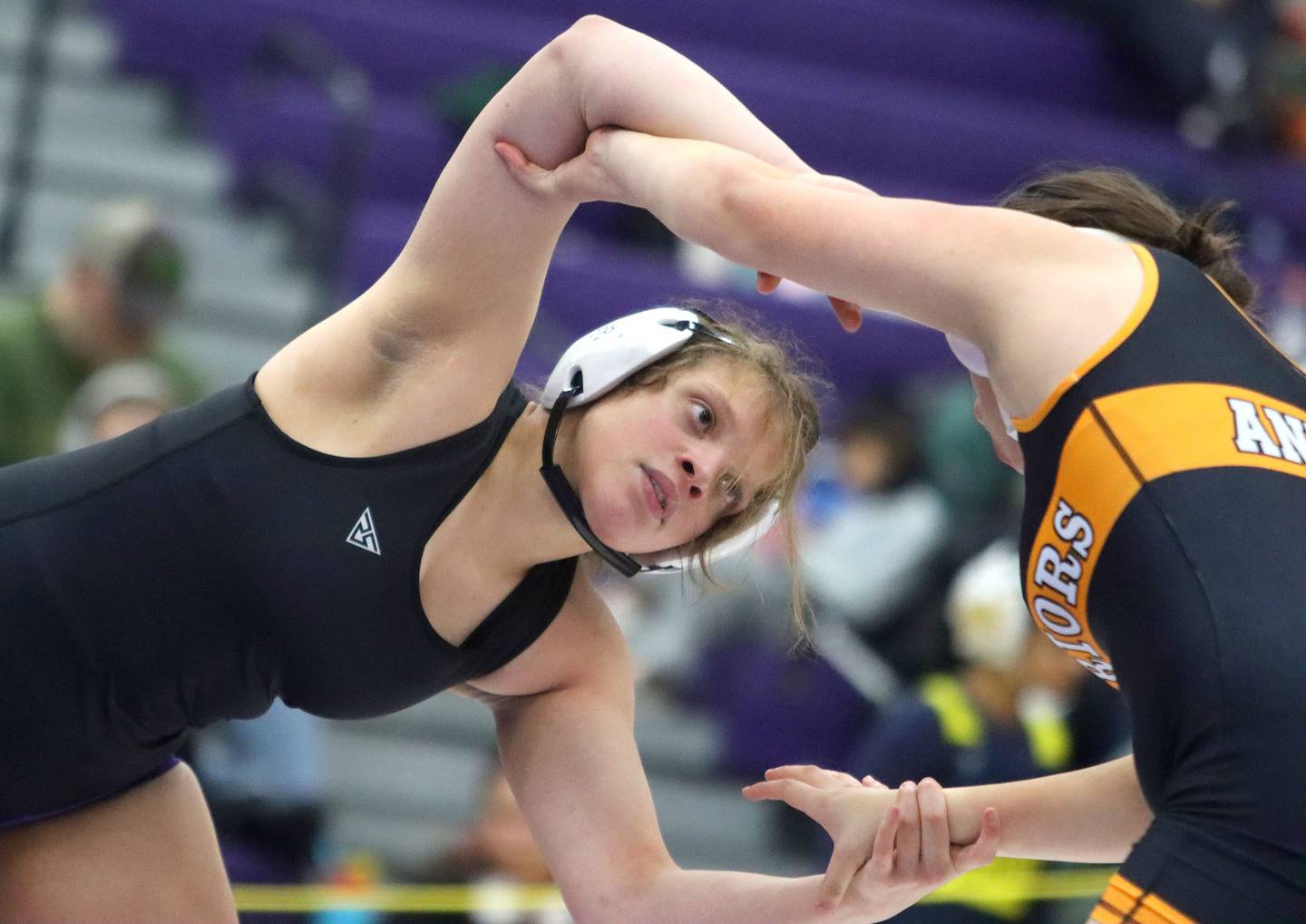 Hampshire’s Samantha Diehl, left, battles McHenry’s Brooklyn Anderson  at 170 pounds in Whip-Pur Women’s Classic varsity girls wrestling on Saturday, Dec. 20, 2025, at Hampshire High School in Hampshire.