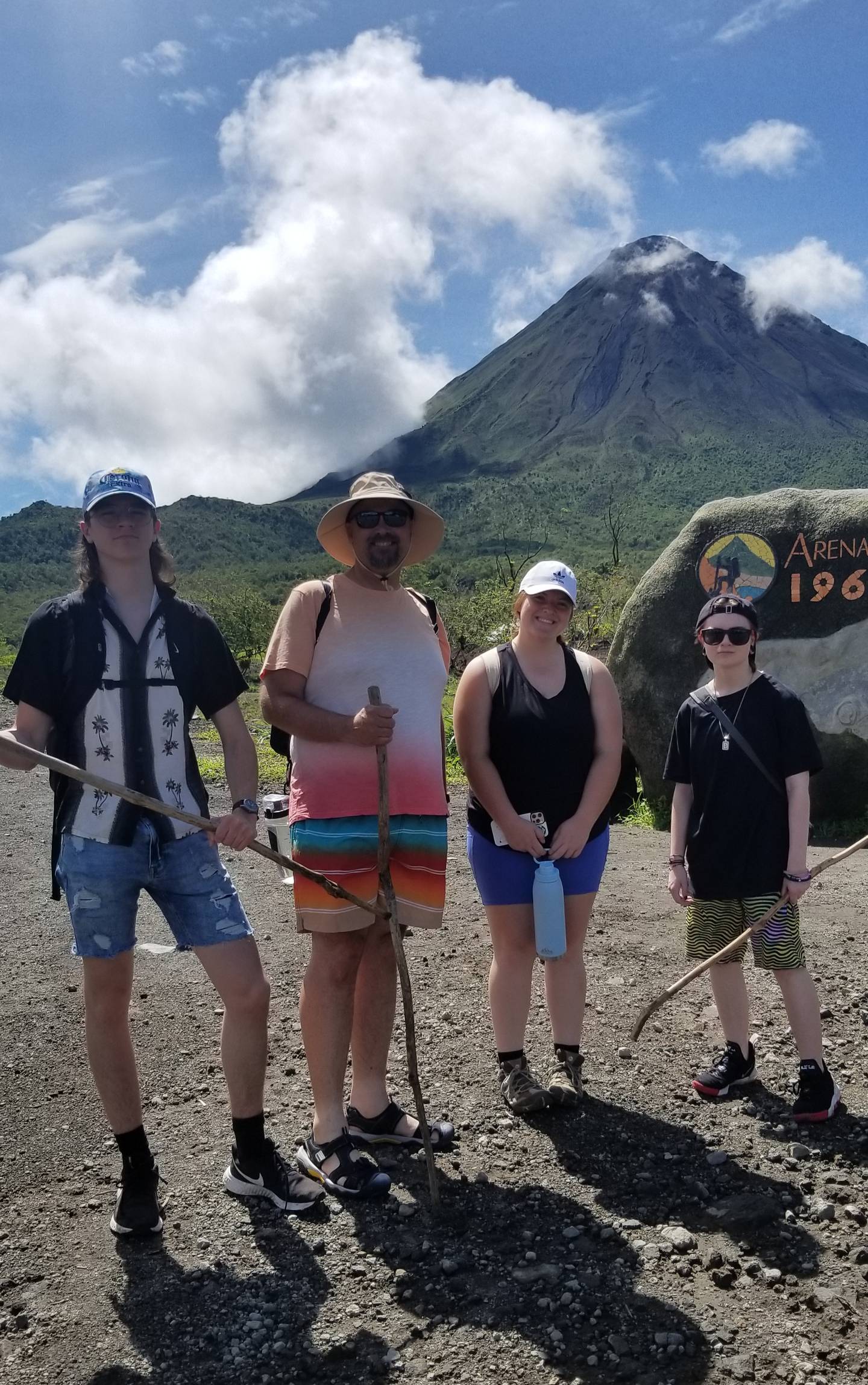 The group from Hall High School preparing to hike up the base of Arenal Volcano (left to right) Reid Sartain, Robert Malerk, Hope Whightsil and Lucas Gruber.