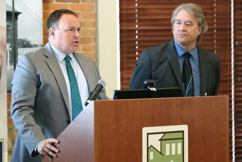 DeKalb County State's Attorney Rick Amato speaks as Bradley Waller, 23rd Judicial Circuit Court Chief Judge, looks on, Wednesday, Sept. 13, 2023 during the Community Protection and Well-Being Forum: A Conversation about the Safe-T Act, in the DeKalb County Community Foundation Freight Room in Sycamore. The event was hosted by the Sycamore Chamber of Commerce.