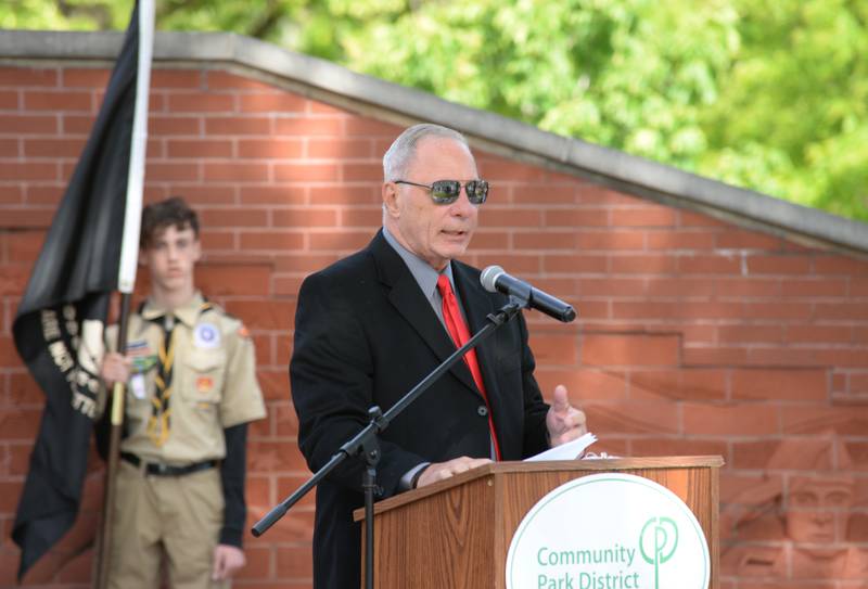 La Grange Park President Dr. Jim Discipio honors veterans attending the Memorial Day ceremony held at Veterans Memorial Park Monday May 26, 2025.