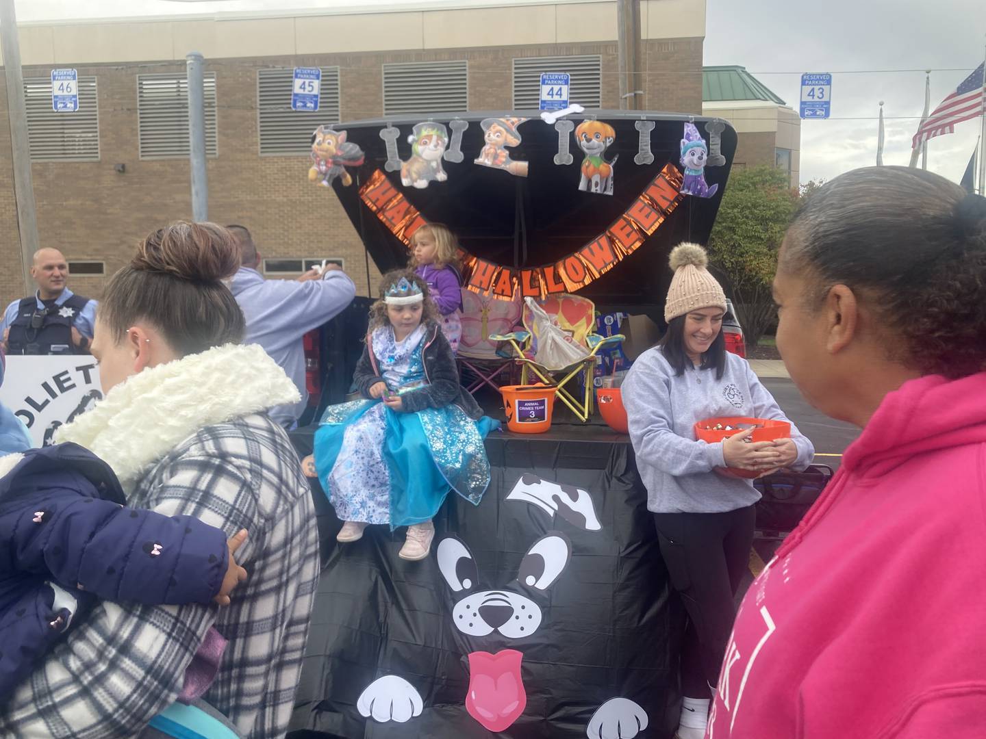 Trick-or-Treaters gather around the trunk from Joliet Township Animal Control.
Saturday, Oct. 25, 2025.