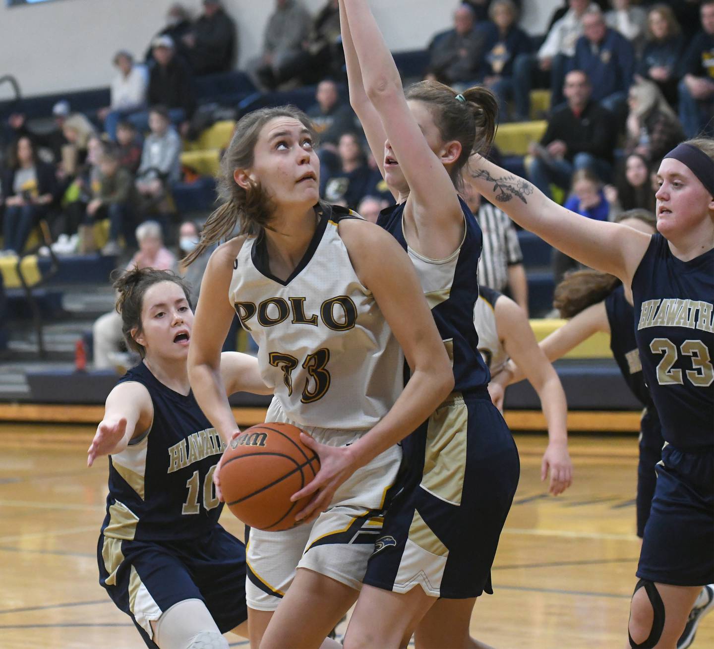Polo's Lindee Poper looks at the basket as she gets ready to put up a shot during 1A regional action against Hiawatha in Polo.