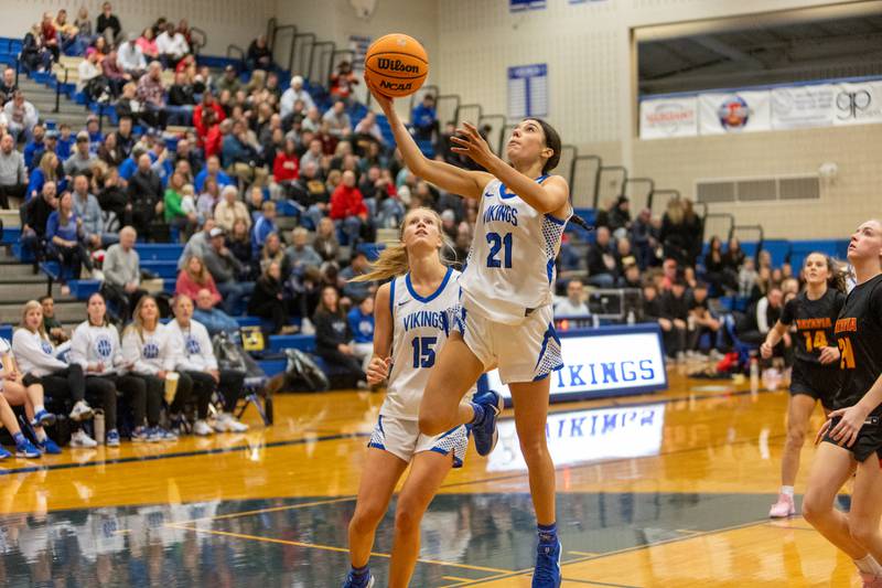 Geneva's Ella Wilkison goes in for the layup against Batavia on Friday, Dec.19,2025 in Geneva.