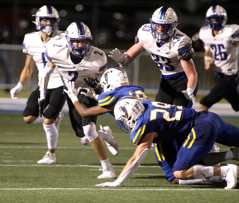 St. Charles North’s Aedan Hayes stares works the North Star defense during a game at Wheaton North on Friday, Sept. 8, 2023.