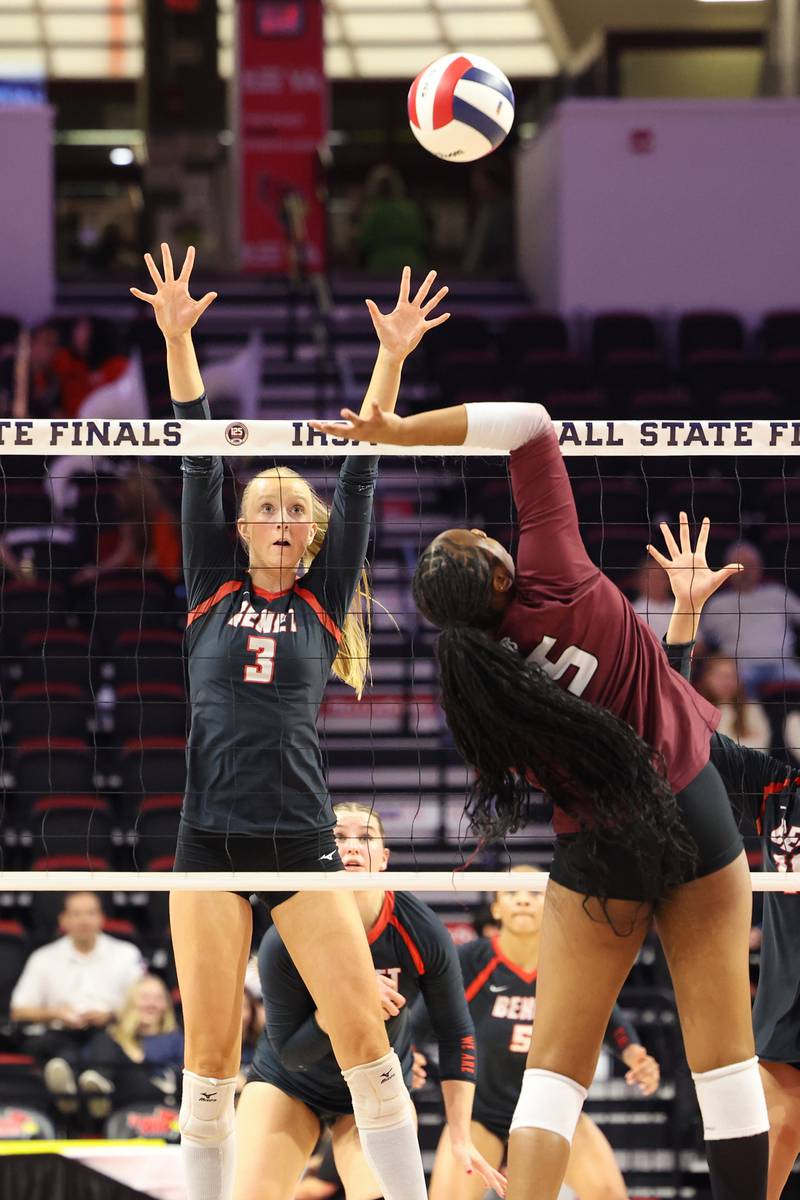 Benet Academy's Molly Welge jumps to block a hit by Lockport's Malia Cole during Benet Academy's victory in two sets, 25-23, 25-16, over Lockport in the IHSA Class 4A State semifinals on Friday, Nov. 14, 2025.