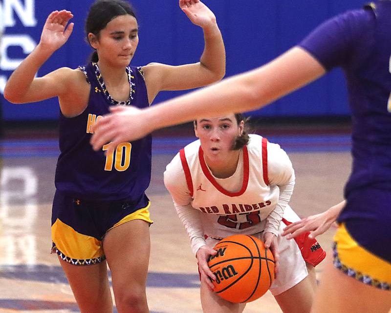 Huntley’s Aubrina Adamik moves the ball against Hononegah in girls basketball at Dundee-Crown High School in Carpentersville on Tuesday, November 25, 2025.