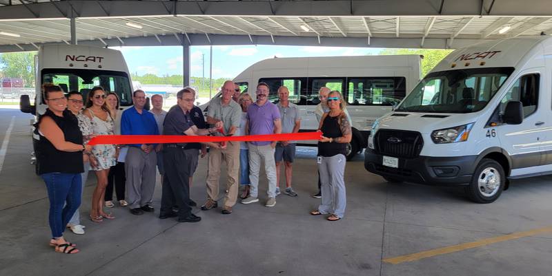 Representatives of the Illinois Department of Transportation cut the ribbon on four new NCAT buses unveiled on Tuesday afternoon in Ottawa.