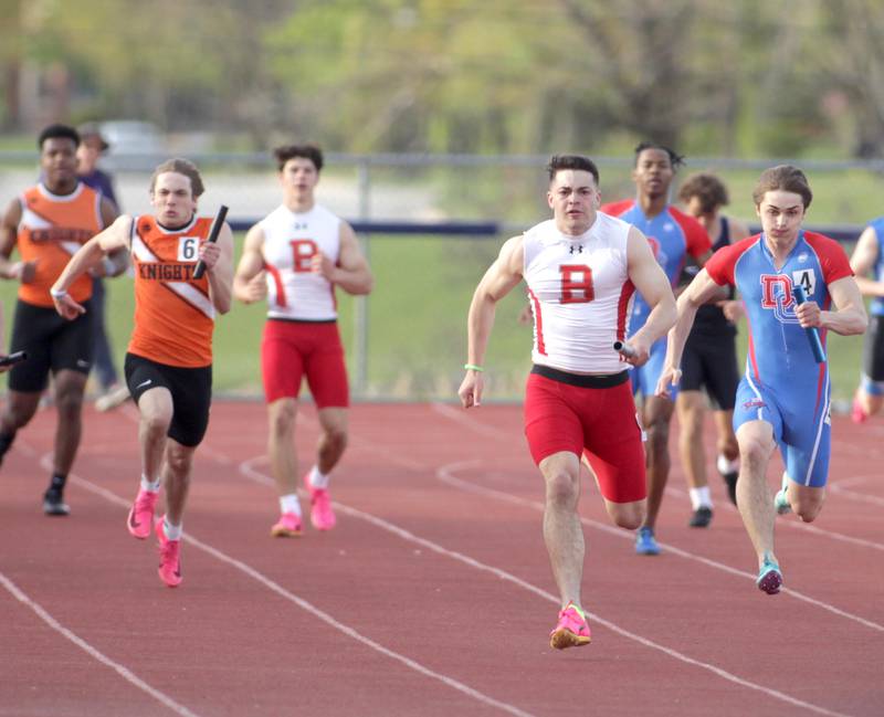 Batavia’s Joe Reid runs the anchor leg of the 4 x 100-meter relay during the Kane County Championships track and field meet at St. Charles North on Friday, May 5, 2023.