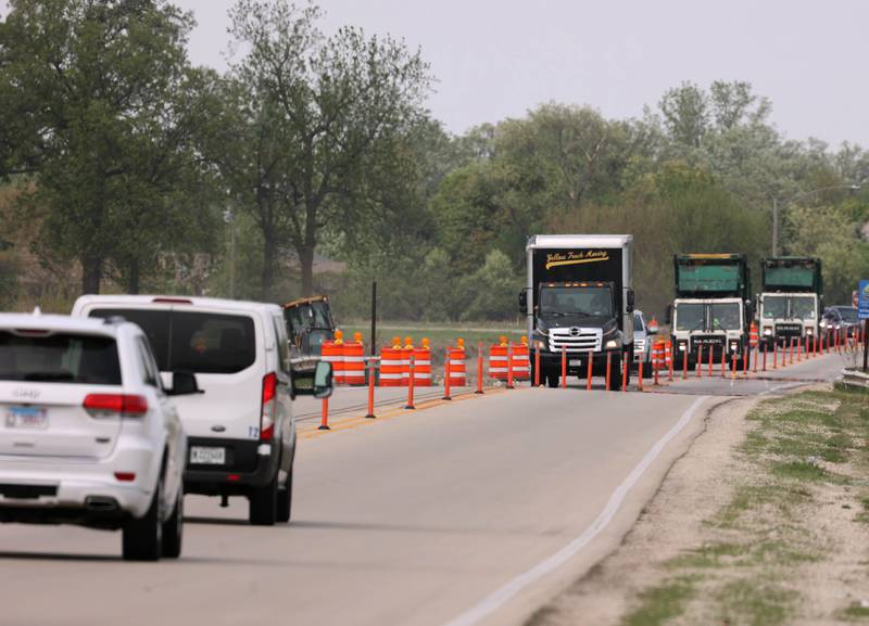 Traffic makes its way through the roadwork cones on Peace Road Thursday, May 15, 2025, as construction continues on the section between Route 64 and Freed Road in Sycamore.