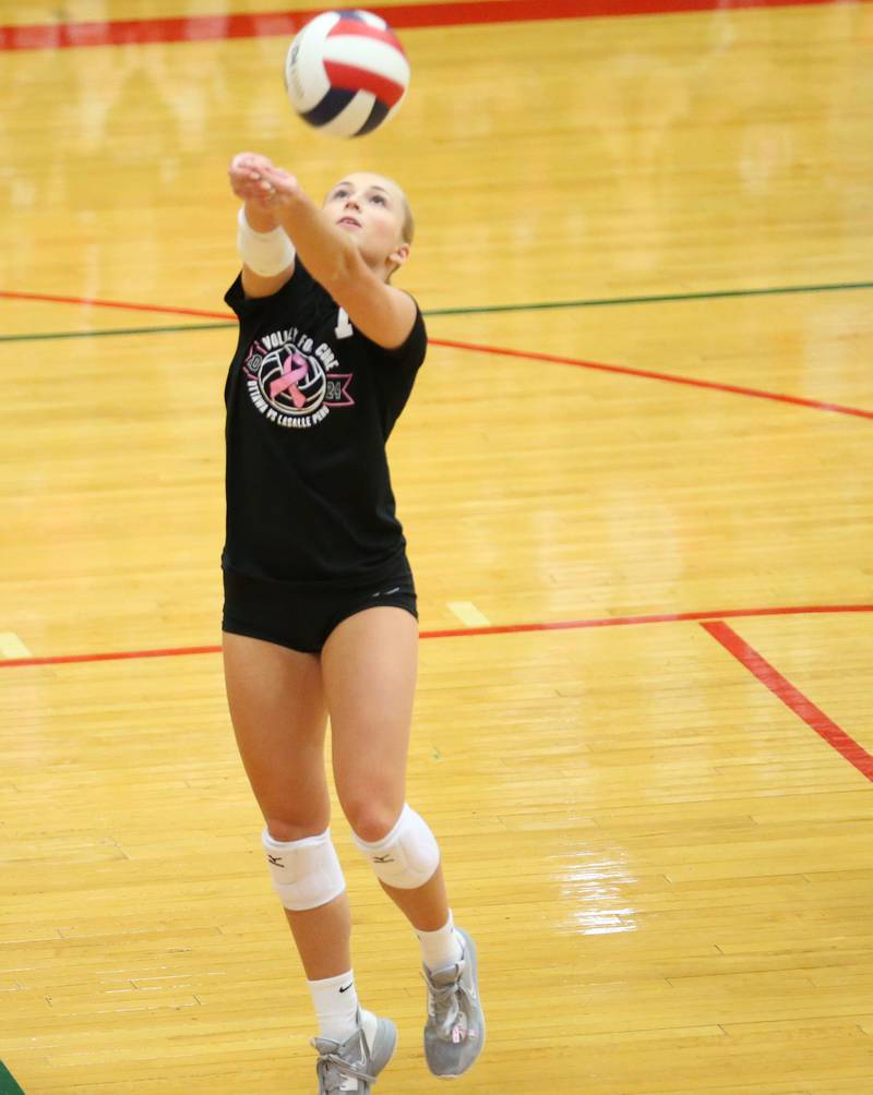 Ottawa's Ella Damron returns a serve from L-P during Volley for a Cure night on Tuesday, Oct. 1, 2024 at AJ Sellett Gymnasium.