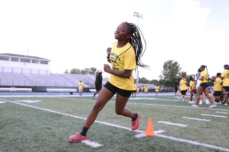Cahli Ewing, of Kankakee, completes a drill at the second annual Suga Summer Camp at Kankakee High School Saturday, July 5, 2025.