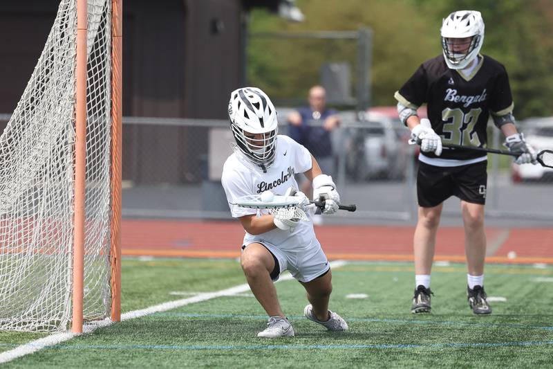 Lincoln-Way’s Logan Lahey makes the save against Oak Forest on Saturday, May 4, 2024 at Lincoln-Way West in New Lenox.