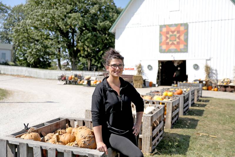 Mikaya Huggins and her husband, Dustin, (not pictured) are celebrating the 10th anniversary of their Sugar Grove Pumpkin Farm this year.