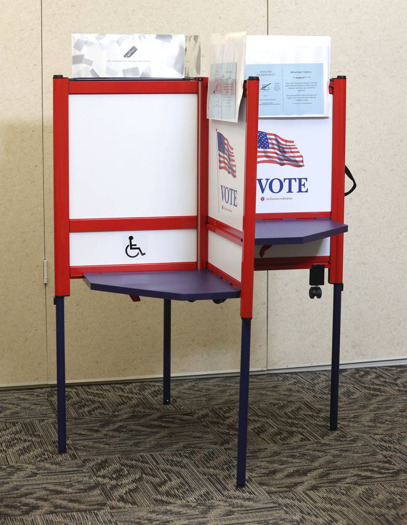 One of the new voting booths is ready for use on the first day the polls were open for early voting Thursday, May 19, 2022, at the polling place in the DeKalb County Legislative Center in Sycamore.