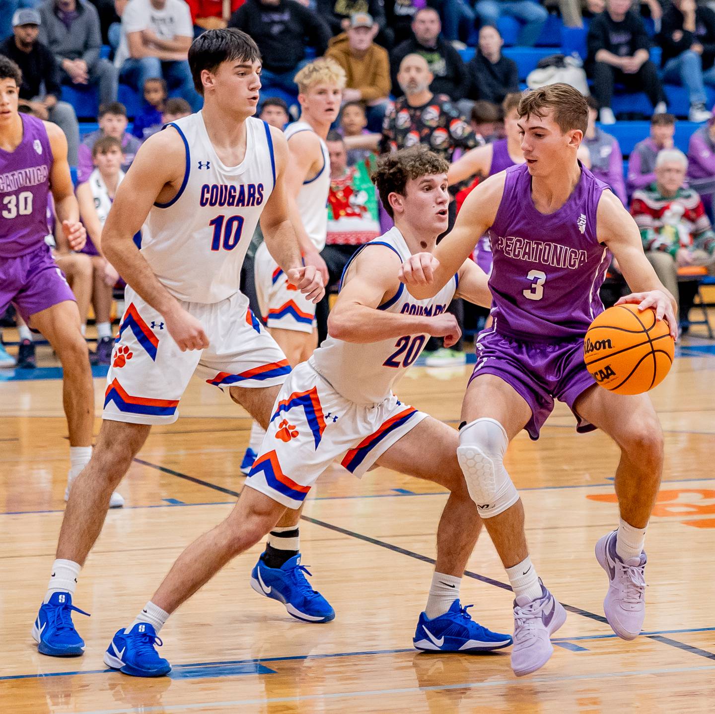 Eastland's Peyton Spears defends Pecatonica's Cooper Hoffman during their matchup at Eastland High School on Thursday, Dec. 19, 2024.