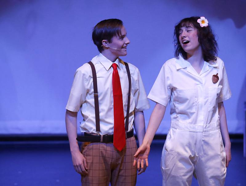 Kadin Henige, playing SpongeBob SquarePants, and Alyssa Thomas, playing Sandy Cheeks, rehearse a scene from the McHenry Community High School’s production of “The SpongeBob Musical” on Tuesday, March 7, 2023, at the school’s Upper Campus.