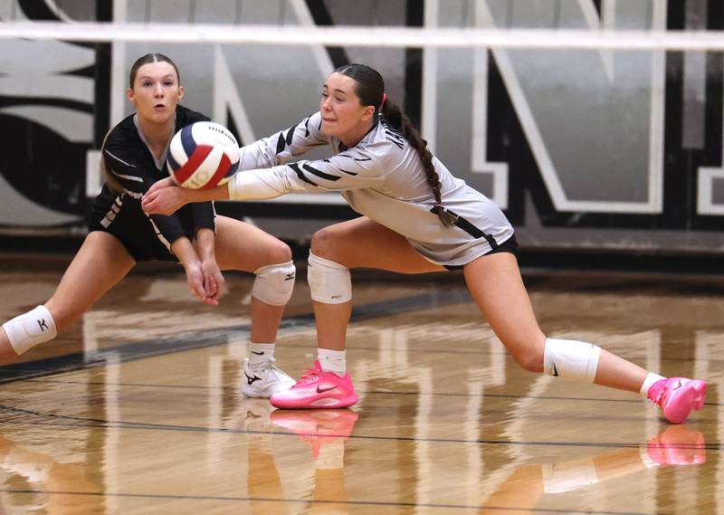 Kaneland's Zoe Kraus digs a DeKalb spike in front of teammate Olivia Davis Thursday, Sept. 4, 2025, during their match at Kaneland High School in Maple Park.