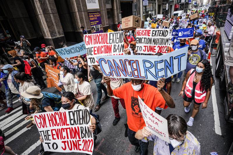 FILE - Housing activists march across town toward New York Gov. Kathy Hochul's office, calling for an extension of pandemic-era eviction protections, Tuesday, Aug. 31, 2021, in New York. Prices paid by U.S. consumers jumped in December 2021 compared to a year earlier, the latest evidence that rising costs for food, gas, rent and other necessities are heightening the financial pressures on America's households. (AP Photo/Mary Altaffer, File)