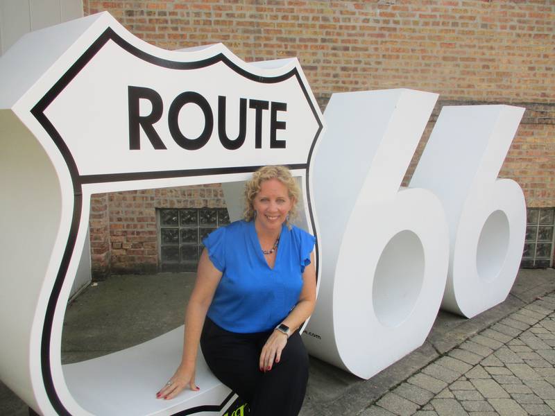 New Joliet Cultural Affairs Director Ann Sylvester poses for a photo at the Route 55 sculpture outside the Joliet Area Historical Museum in downtown Joliet. Aug. 15, 2025