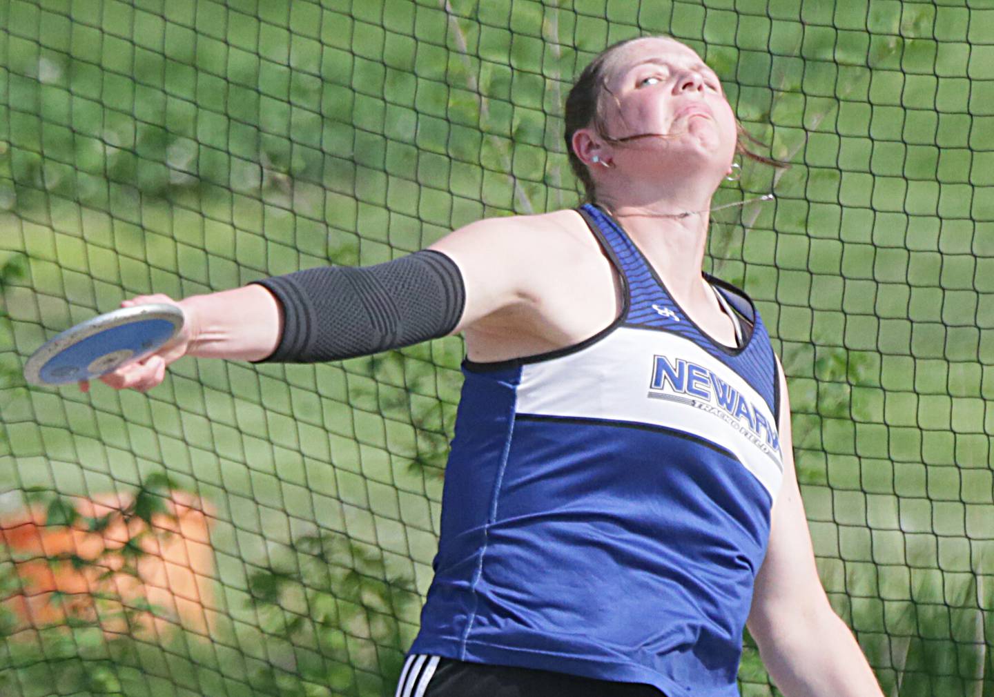 Newark's KJ Friestad launches the discus in the Class 1A sectional girls track meet on Thursday, May 12, 2022 in Seneca.