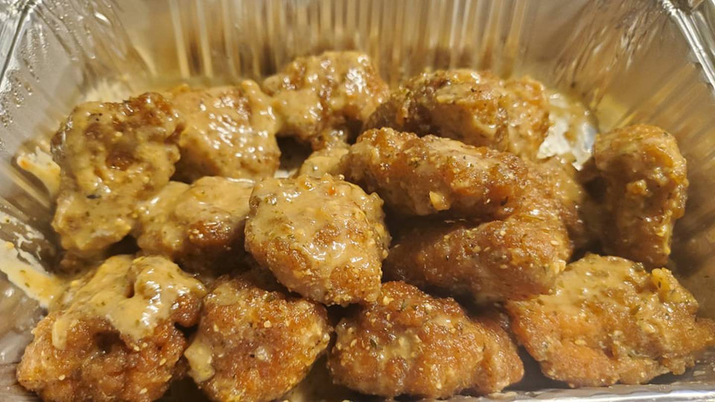 Words cannot describe how truly delectable these bonelenss wings from Rosati's Pizza in Shorewood were. Tender and coated with plenty of garlic butter and Parmesan. They arrived hot and leftovers were equally delicious cold the next day – because who could wait to reheat them?