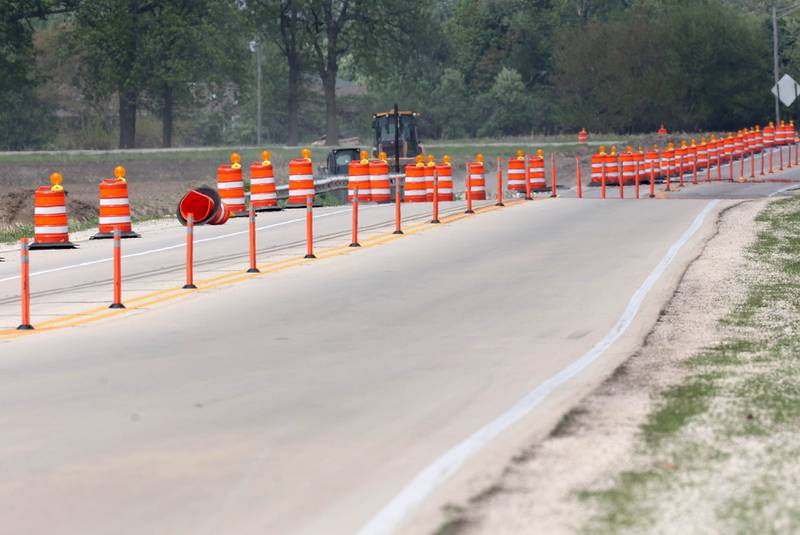 Traffic cones line Peace Road Thursday, May 15, 2025, as construction continues on the section between Route 64 and Freed Road in Sycamore.