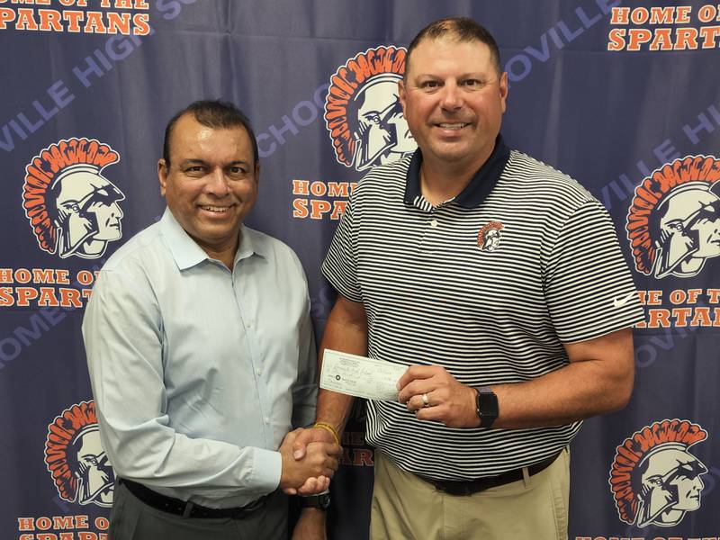 Romeoville Mobil owner Mohammed Qurashi presented a $500 donation to Valley View Community Unit School District 365U for the 11th straight year to enhance the district’s science, technology, engineering and math programs.