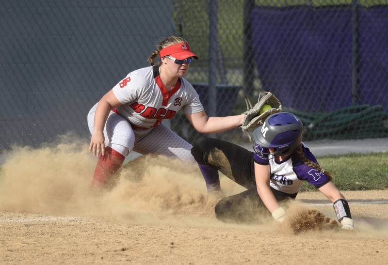 Bradley-Bourbonnais' Rhaina Boggess applies a late tag as Manteno's Alyssa Singleton slides in safely at third base in the fourth inning of a game on Thursday, May 15, 2025.