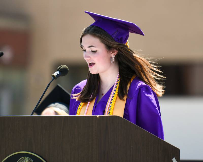 Downers Grove North senior and Student Master of Ceremonies Fiana Doyle talks during graduation on Sunday May 19, 2024, held at Downers Grove North High School.