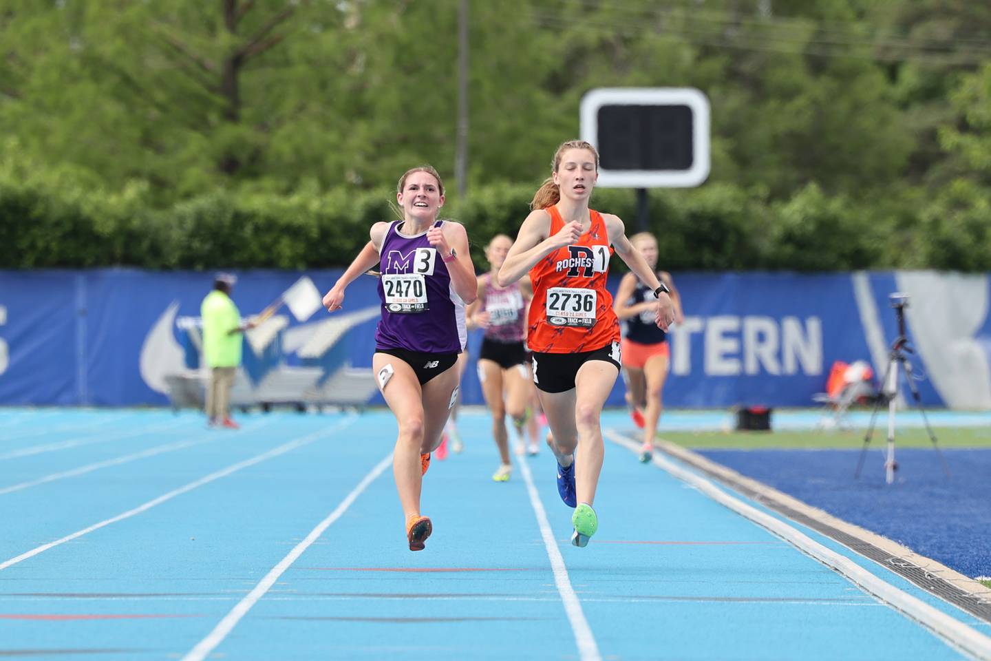 Manteno’s Klarke Goranson, left, battles for second place against Rochester's Brooke Zeibert in the 1600 m run during the IHSA Class 2A Girls Track & Field State Finals on Saturday, May 24, 2025.